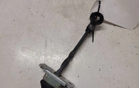 Mazda 5 Front door check strap stopper
