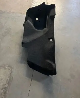 Trunk/boot lower side trim panel