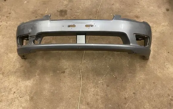 Subaru Legacy Front bumper 57704AG000