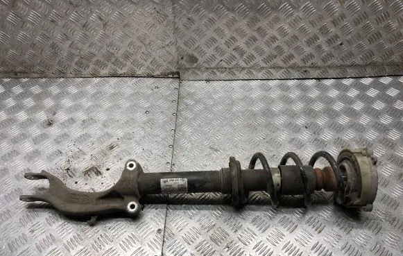 Audi A4 S4 B9 Front shock absorber with coil spring 8W0031AK