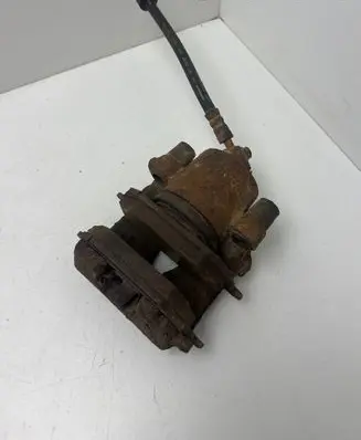 Volkswagen Golf IV Front brake caliper