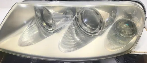 Volkswagen Touareg I Headlight/headlamp 7L6941015BK