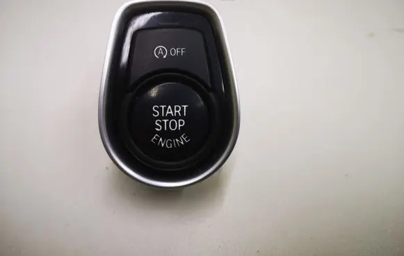 Engine start stop button switch