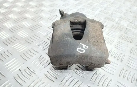 Volkswagen Golf IV Front brake caliper