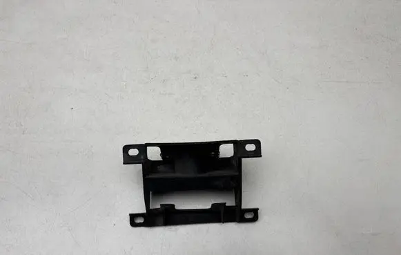 Volkswagen Touareg I Headlight washer nozzle holder 7L6807361