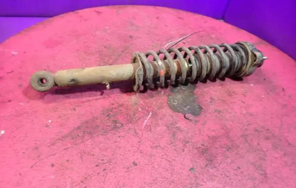 Mitsubishi Carisma Rear shock absorber with coil spring MR455351