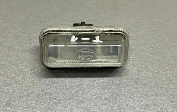 Toyota Avensis T250 Number plate light E1001479 8160555