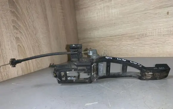 Rear door exterior handle/bracket