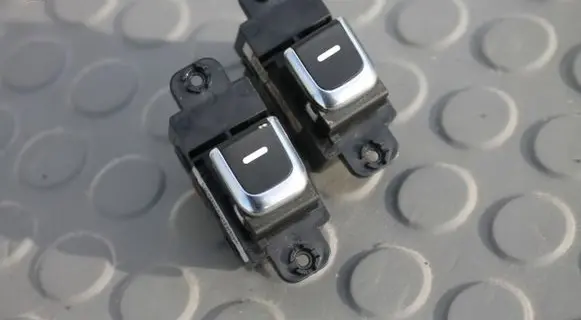 KIA Carens III Electric window control switch