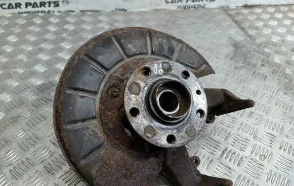 Front wheel hub spindle knuckle