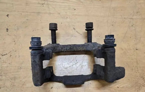 Volkswagen Caddy Brake caliper pad carrier rear 