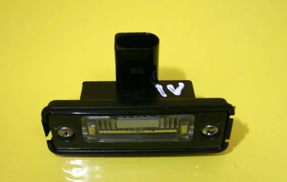 Volkswagen Golf IV Number plate light 1J6943021