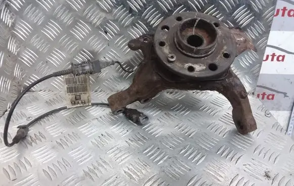 Opel Zafira B Front wheel hub spindle knuckle 13118565