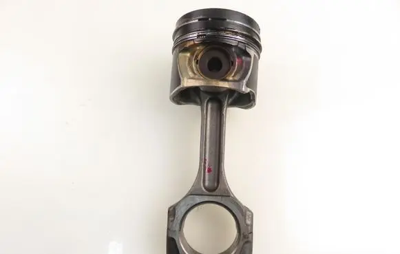 Piston with connecting rod
