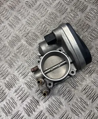 Volkswagen Touran I Throttle valve 06A133062AD 10252T