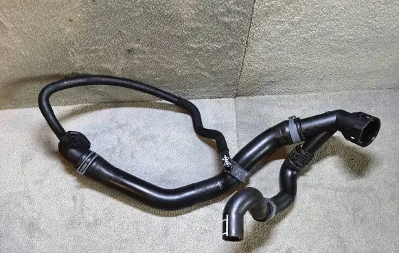 Volkswagen Golf VIII Engine coolant pipe/hose 5Q0122101EA