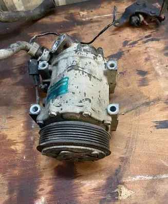 Mazda 3 I Air conditioning (A/C) compressor (pump) 1S7H19D629BD 0011801