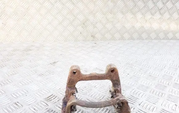 Volkswagen PASSAT B6 Brake caliper pad carrier rear 
