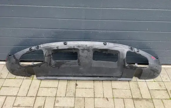 Volkswagen Touareg I Front bumper lip 