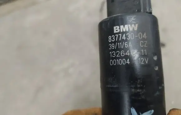 BMW 3 E90 E91 Headlight washer pump 8377430
