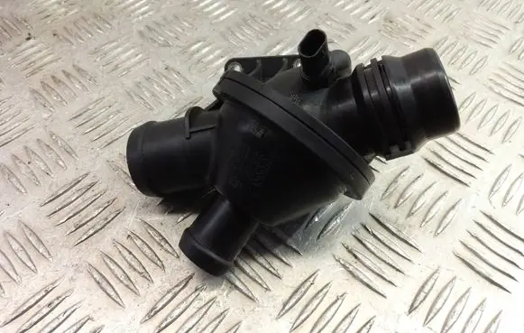 Thermostat/thermostat housing