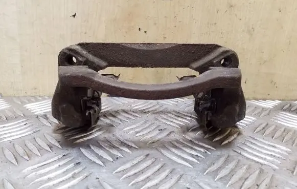 Subaru Outback Brake caliper pad carrier rear 