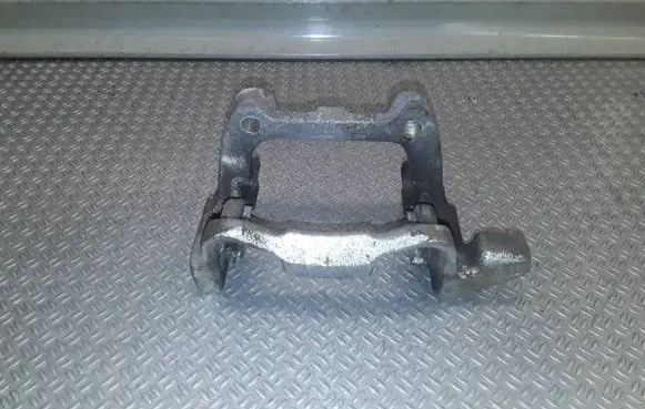 Volkswagen Caddy Brake caliper pad carrier rear 