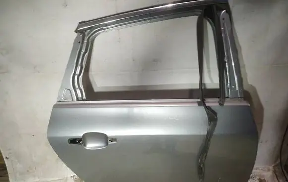 Opel Astra J Rear door pilkos