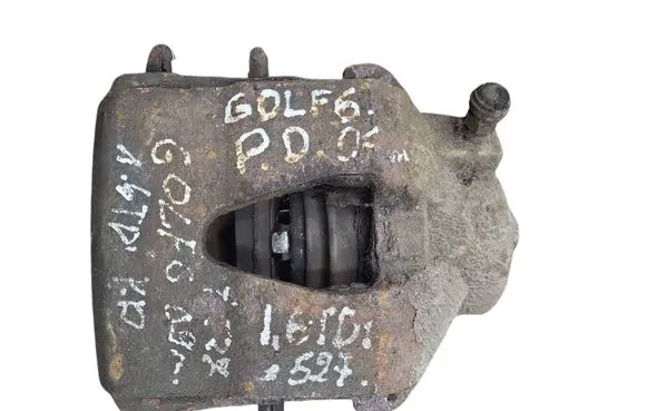 Volkswagen Golf VI Front brake caliper 
