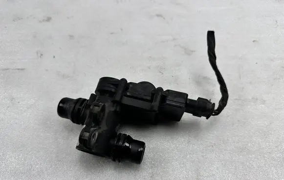 Coolant heater control valve