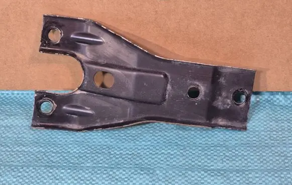 Radiator support slam panel bracket