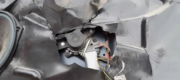 Chrysler Voyager Front door window regulator with motor