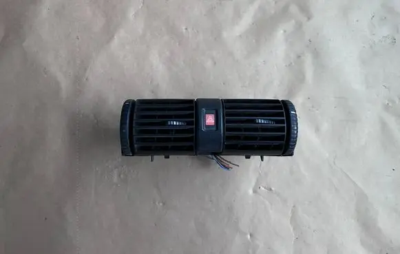 Opel Astra G Dash center air vent grill 90560344