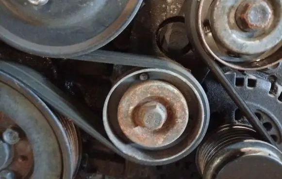 Opel Astra H Generator/alternator belt tensioner