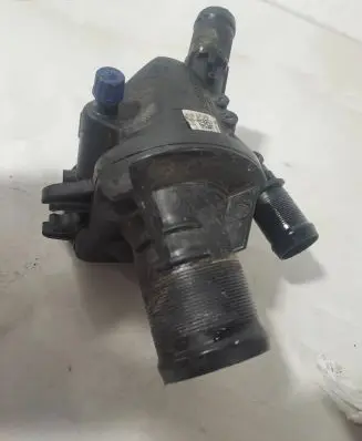 Thermostat/thermostat housing