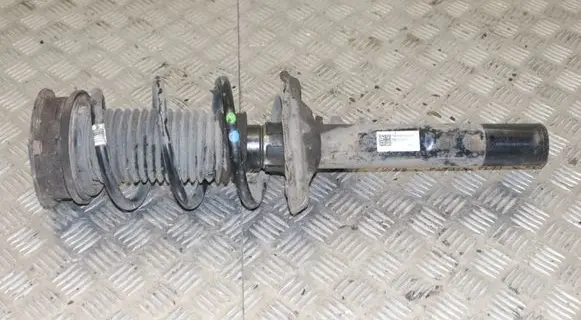 Volkswagen Golf VII Front shock absorber with coil spring 5Q0413023FJ