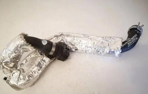 Porsche Panamera (970) Engine coolant pipe/hose 97057273400