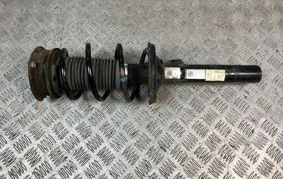 Volkswagen Golf VIII Front shock absorber with coil spring 5WA413023N