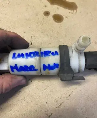 KIA Carens III Headlight washer pump 