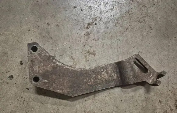 Volkswagen PASSAT B3 Power steering pump mounting bracket 027145544