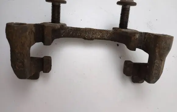 Saab 9-3 Ver2 Brake caliper pad carrier rear 93172188