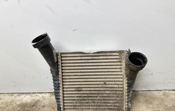 Volkswagen Touareg II Intercooler radiator 7L6145803D