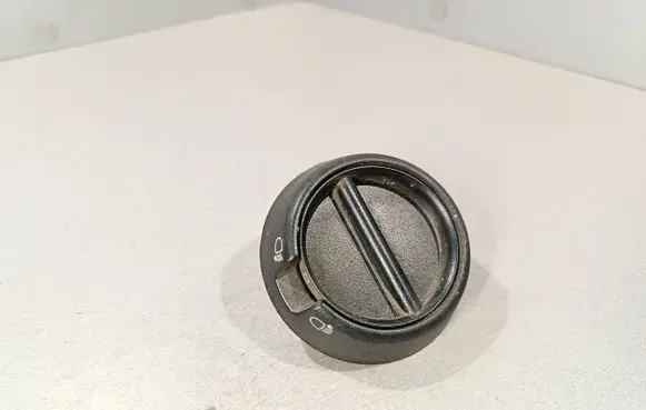 Headlight level height control switch