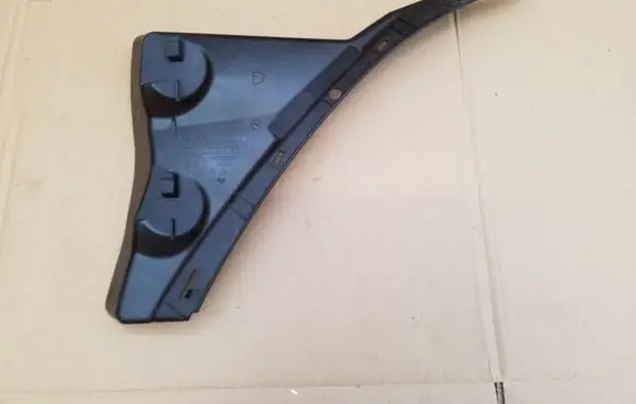 Engine bonnet/hood lock trim molding