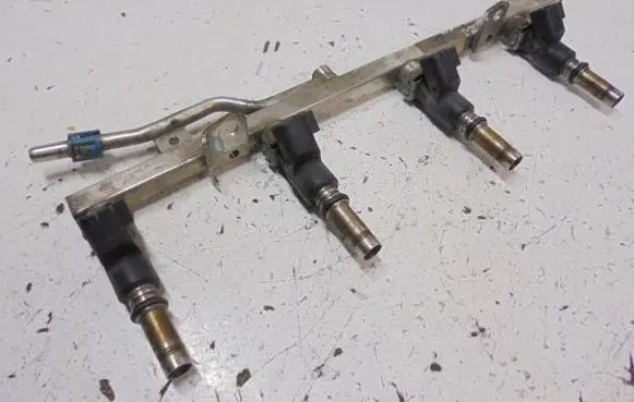 Opel Astra H Fuel injector 25380933