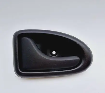 Dacia Logan I Front door interior handle 7700830078