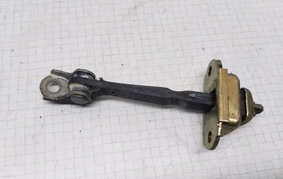 Nissan Primera Front door check strap stopper