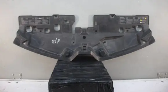 Engine bonnet/hood lock trim molding