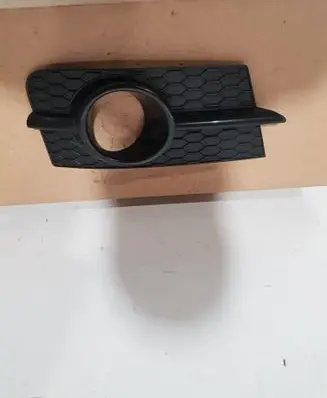 Suzuki Swift I Front grill 187102R