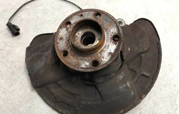 Front wheel hub spindle knuckle